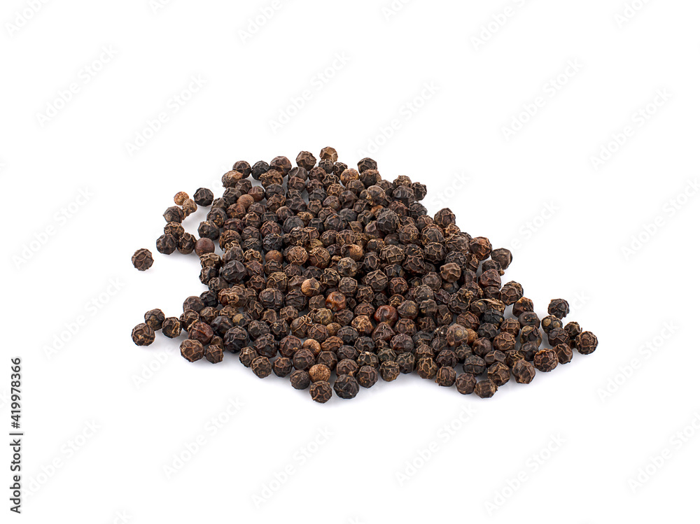 Black pepper placed on a white background Black pepper placed on a white background