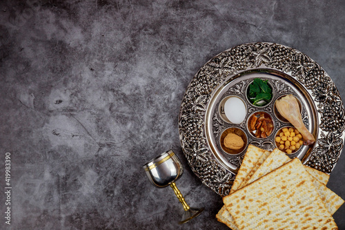Matzoh bread with kiddush and seder. Jewish Passover holiday concept. photo