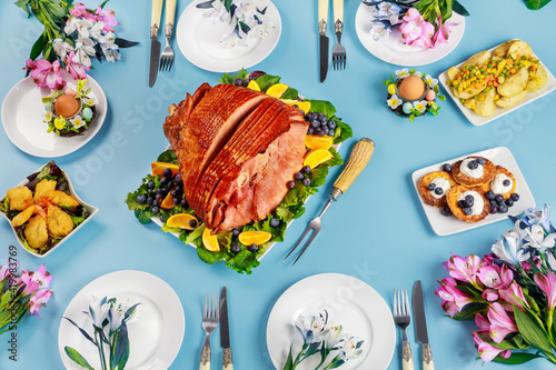 Canvas Print Festive Easter table with ham, salad and pancakes.