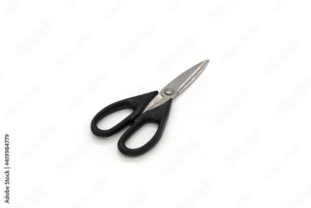 Modern scissors on a isolated white background. Modern scissors on a isolated white background.