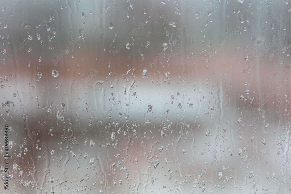 Obraz premium Raindrops on the glass window as a background.