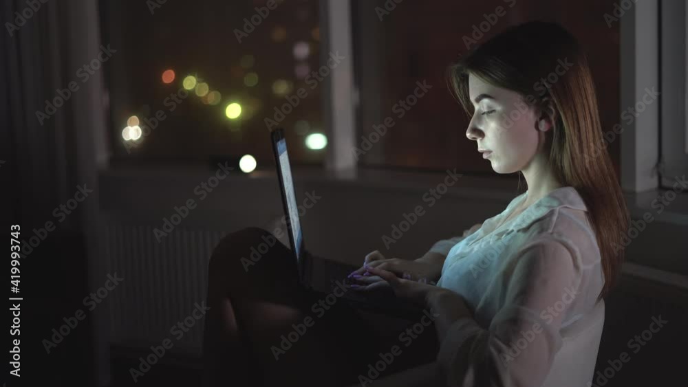 young beautiful caucasian woman is sitting in lingerie at home with a laptop. Typing text on the keyboard. concept of communication in social networks and chats. copy space. young beautiful caucasian woman is sitting in lingerie at home with a laptop. Typing text on the keyboard. concept of communication in social networks and chats. copy space.