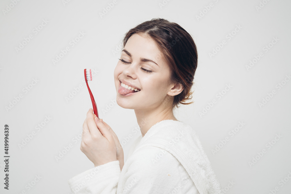 pretty woman in white coat toothbrush health hygiene pretty woman in white coat toothbrush health hygiene