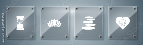 Canvas Print Set Massage, Stack hot stones, Lotus flower and Old hourglass