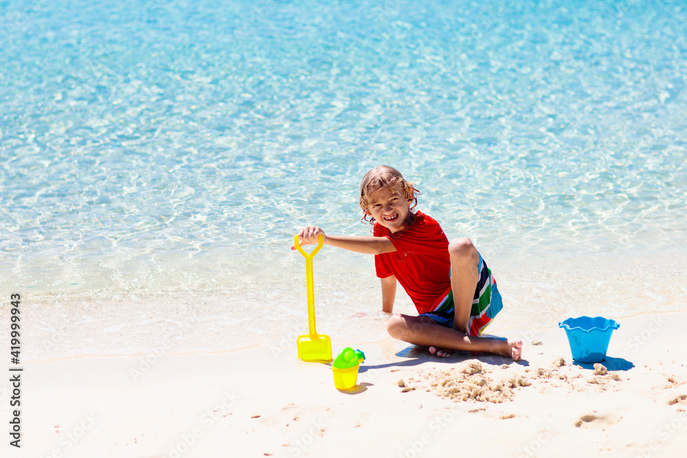 Kids playing on beach. Children play at sea. Kids playing on beach. Children play at sea.
