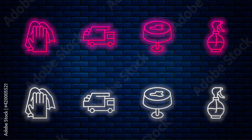 Set line Garbage truck, Stain on the tablecloth, Cleaning service and Water spray bottle. Glowing neon icon on brick wall. Vector