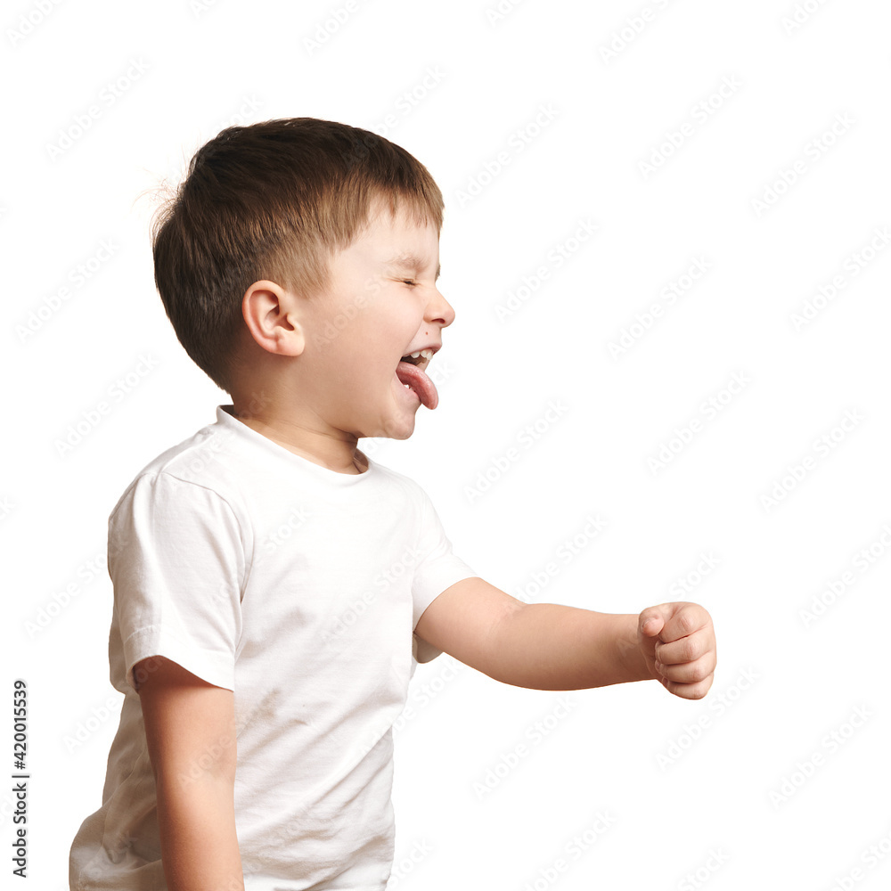 isolated child with closed eyes shows tongue on white background. space for insertion. space for copy. isolated child with closed eyes shows tongue on white background. space for insertion. space for copy.
