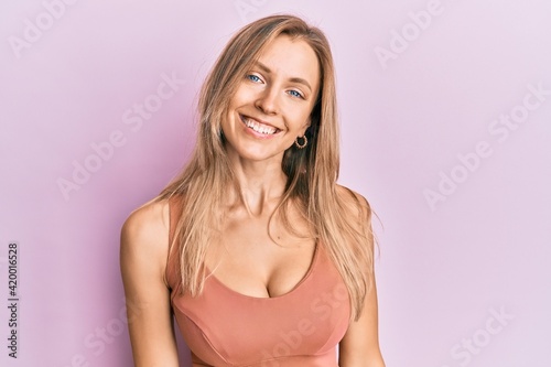 Beautiful caucasian woman wearing casual clothes with a happy and cool smile on face. lucky person.