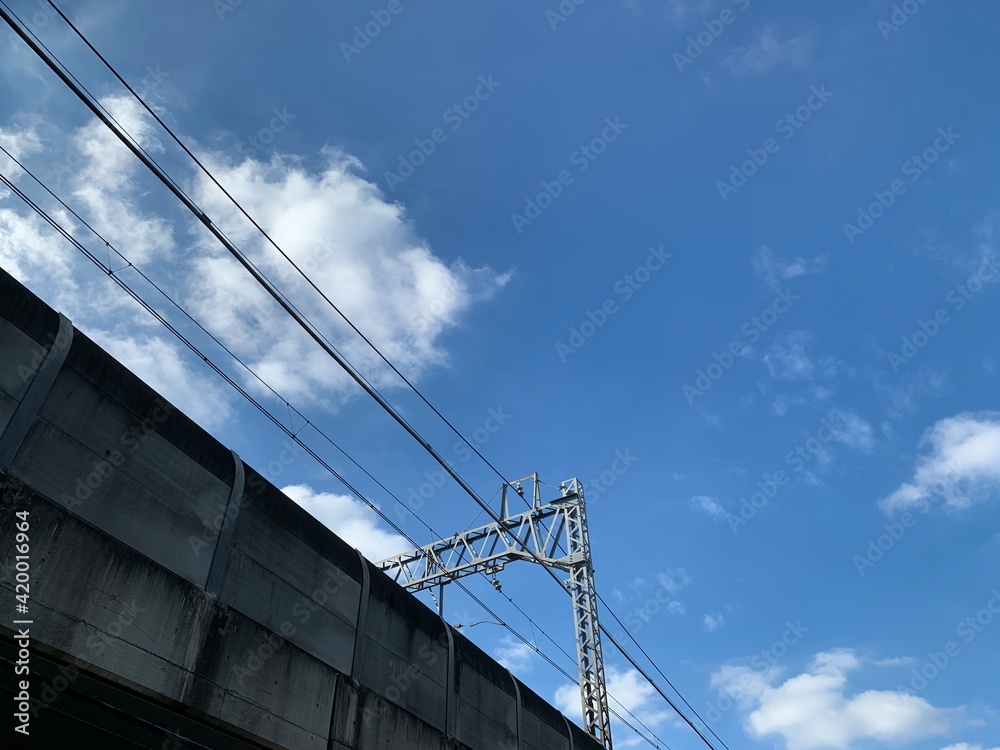 Electrified railway cables and gantry on an elevated railway line Electrified railway cables and gantry on an elevated railway line