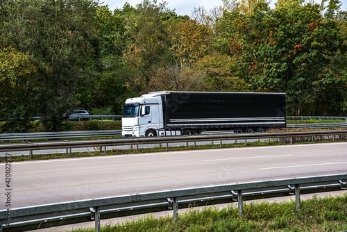 Truck on the roads of Europe. Logistics and delivery of cargo