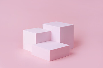Geometric shapes podium for product display. Monochrome platform on pink background. Stylish background for presentation. Minimal style.