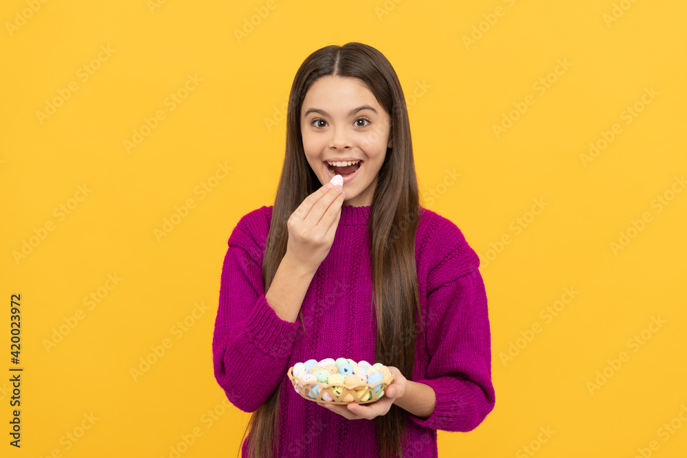 going to eat. funny child hold quail eggs. teenager girl wear smiling. easter bunny hunt