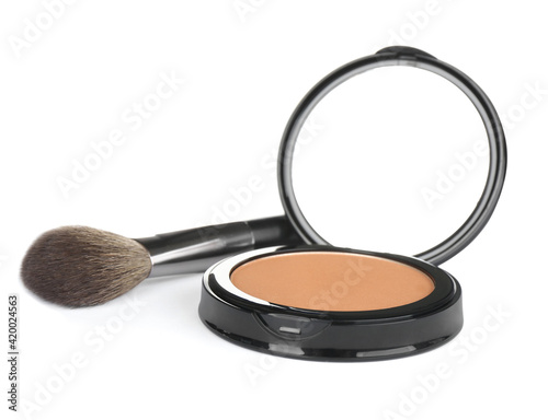 Face powder with brush on white background. Makeup product