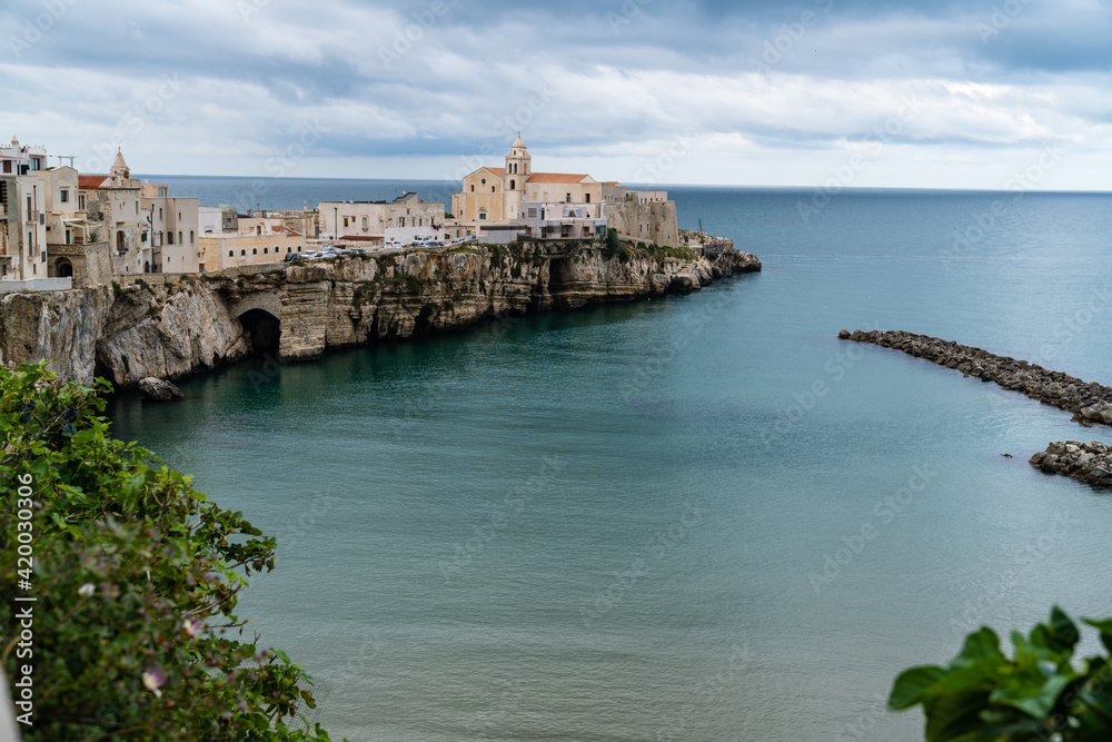 View of old city of Vieste towards sea after rain.