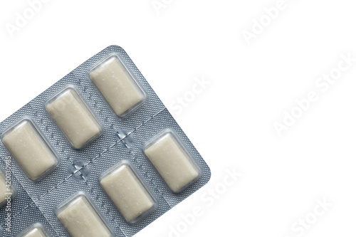 Nicotine chewing gum on a white background. 
Nicotine chewing gum to help stop smoking.
Stop smoking nicotine gum in a package isolated on a white background.