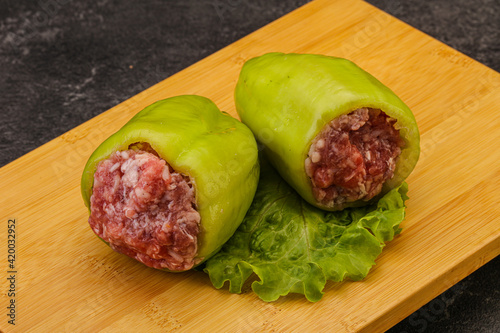 Raw stuffed bell pepper with meat