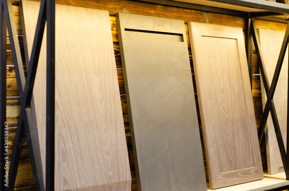 Massive wooden furniture facades in the store Massive wooden furniture facades in the store