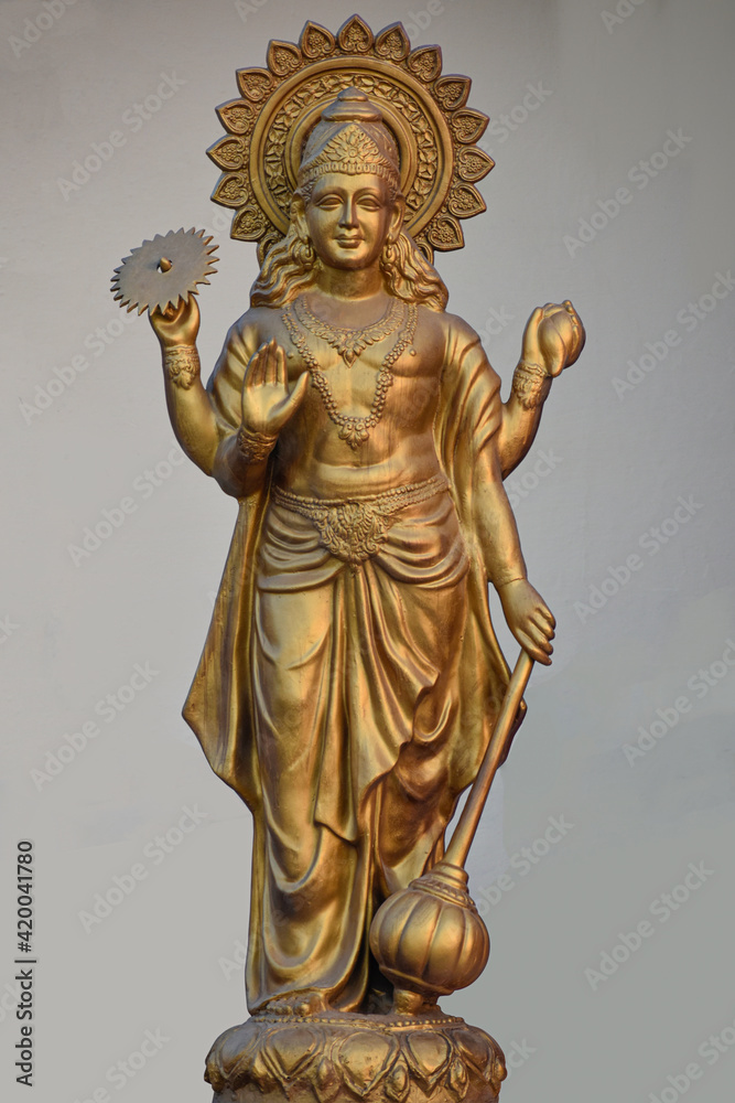 Haridwar, Uttrakhand/ India - March 1 2021: Golden Portrait of respected Hindu god at Railway Station of Haridwar, India