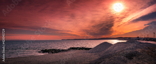 Dramatic sunset and cloudscape panorama over the Vineyard Sound and Woods Hole in Massachusetts, USA