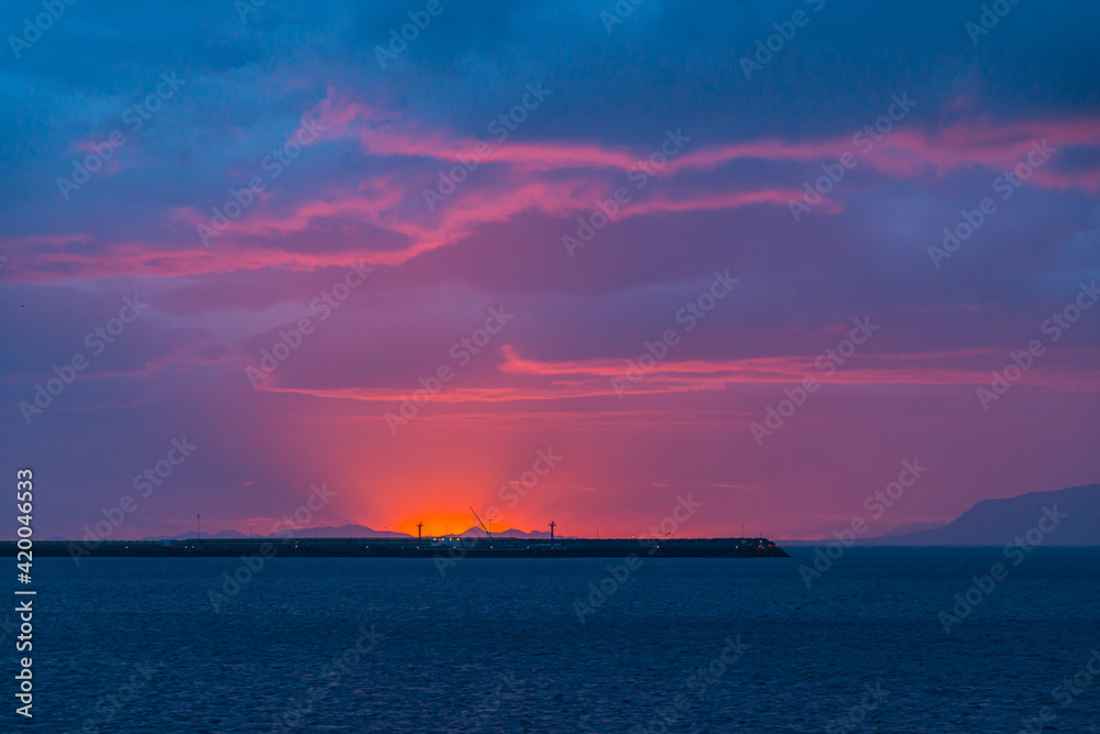 Summer solstice over the sea in Reykjavik, Iceland