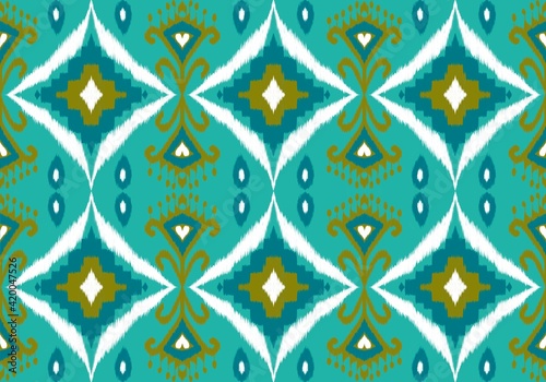 Seamless pattern tribal art Ikat Ogee in traditional classic green  color background. Abstract background for textile design, wallpaper, surface textures. Boho Style.