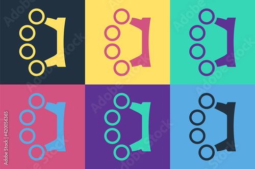 Pop art Brass knuckles icon isolated on color background. Vector