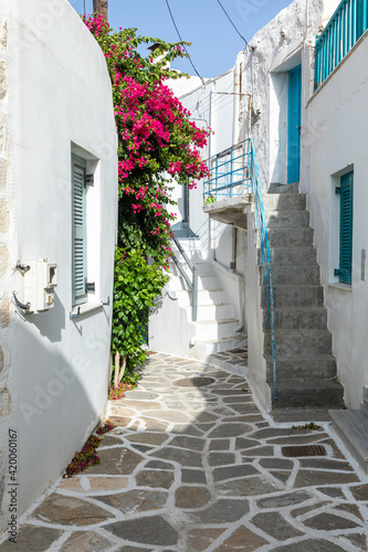 Fototapeta Naklejka Na Ścianę i Meble -  Narrow street of the old town with, Parikia, Paros Island, Greece.