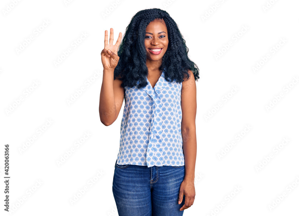 Beautiful african american woman wearing casual summer shirt showing and pointing up with fingers number three while smiling confident and happy. Beautiful african american woman wearing casual summer shirt showing and pointing up with fingers number three while smiling confident and happy.