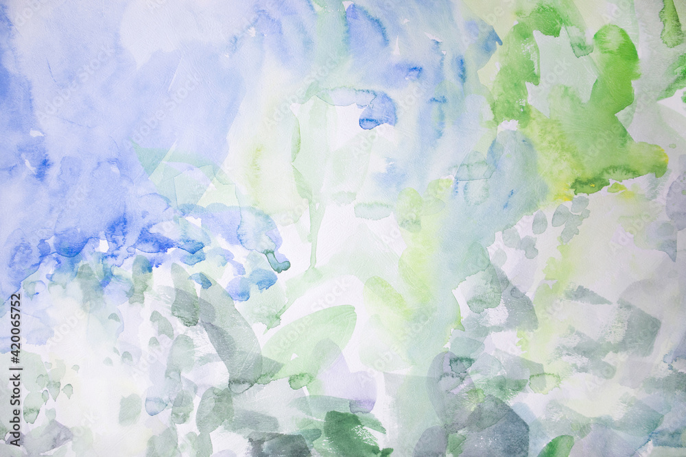 Abstract watercolor background. Light shades of green white and blue colors. Simple hand painted wallpaper.