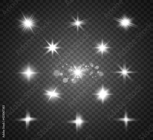 Set of bright beautiful stars. Light effect. Bright Star. Beautiful light to illustrate. Christmas star. White glitter sparkles with special light effect. Vector sparkles on a transparent background. 