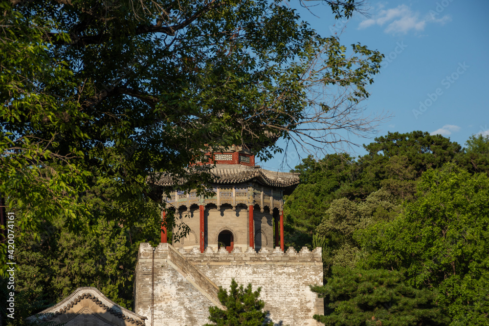 A historical beautiful temple view across trees A historical beautiful temple view across trees