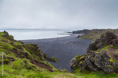 Djúpalónssandur is a sandy beach and bay on foot of Snæfellsjökull in Iceland photo