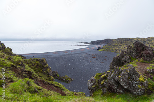 Djúpalónssandur is a sandy beach and bay on foot of Snæfellsjökull in Iceland photo