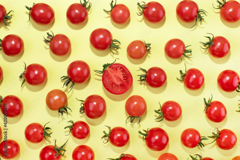 Cherry tomatoes on a yellow background. Food. Red tomatoes. Cherry tomatoes Cherry tomatoes on a yellow background. Food. Red tomatoes. Cherry tomatoes