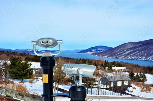 Coin Operated Binoculars looking to beautiful scenic view at Scenic Overlook in town of South Bristol. Overlooking Canandaigua Lake, one of Finger Lakes in New York. 