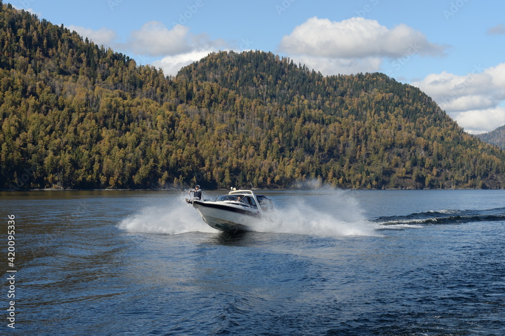 Fototapeta premium Boat on Lake Teletskoye. Altai Republic. Western Siberia