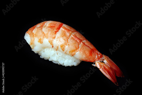 sushi with shrimp isolated on black background healthy dietary food