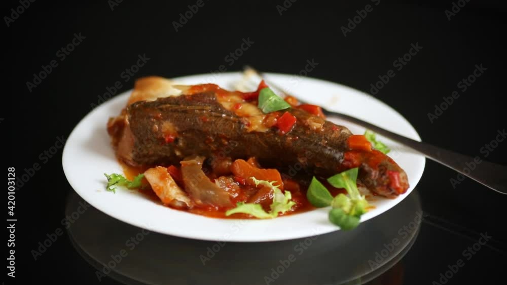 whole fish hake stewed with carrots, beets, peppers and other whole fish hake stewed with carrots, beets, peppers and other