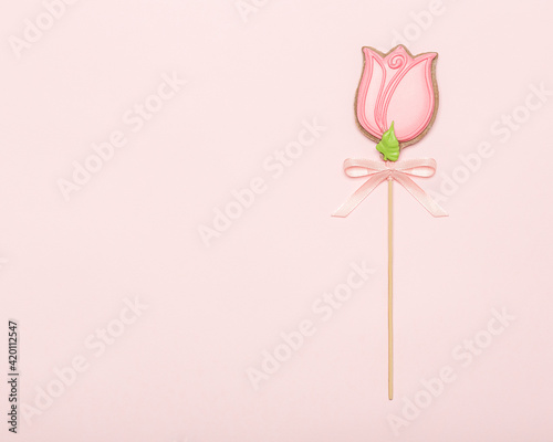 Gingerbread in the shape of a tulip. festive creative card. concept for women in spring