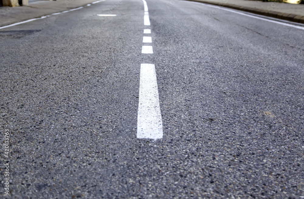Direction line for cars on a road Direction line for cars on a road