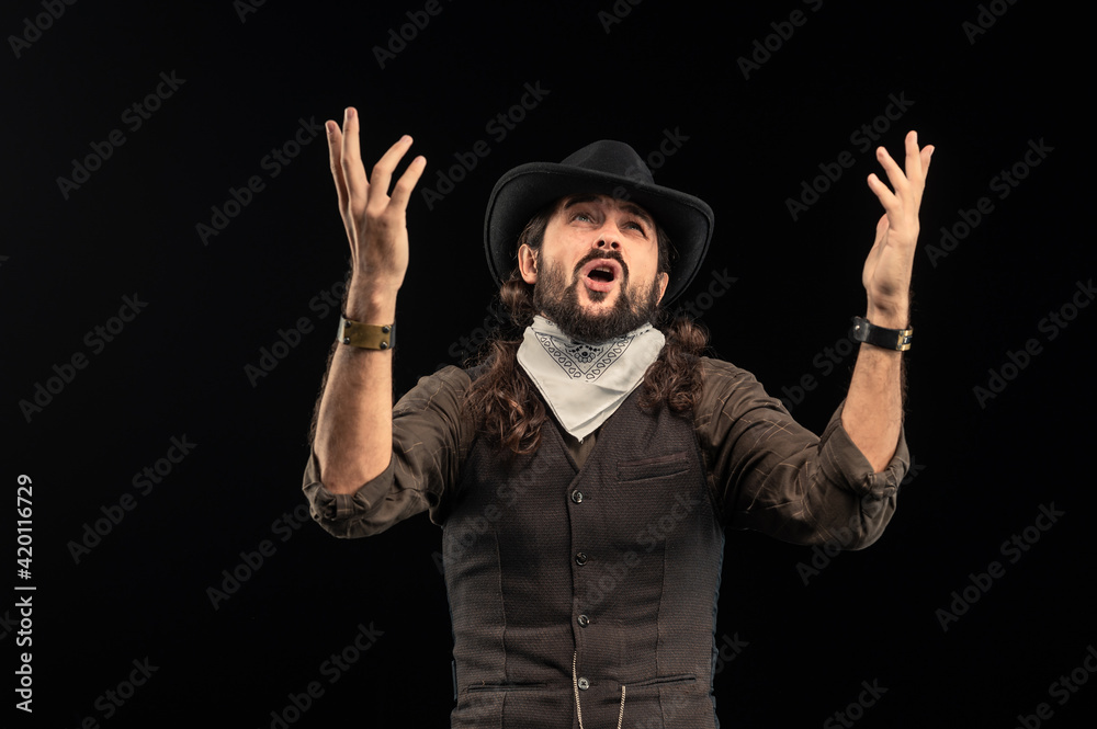 Cowboy with guns. Studio shooting Cowboy with guns. Studio shooting
