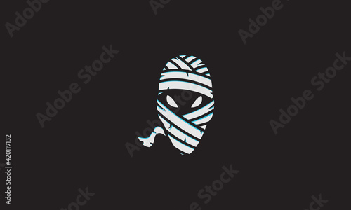 aliens head as mummy logo symbol vector icon illustration design