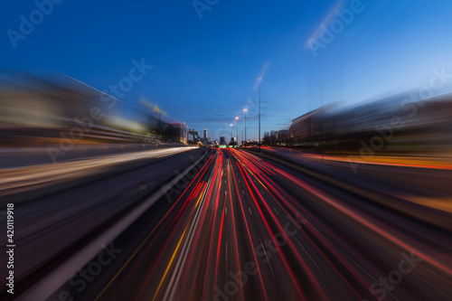 Night view of Interstate 75 and 85 freeways with motion blur near downtown Atlanta Georgia. 