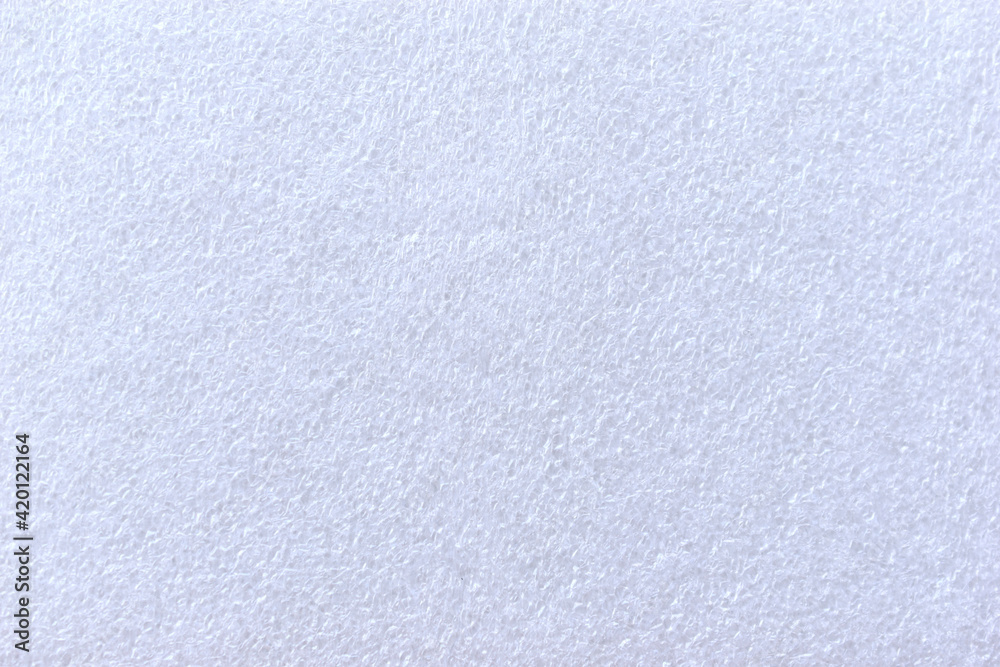 Obraz premium White porous surface of the foam filler