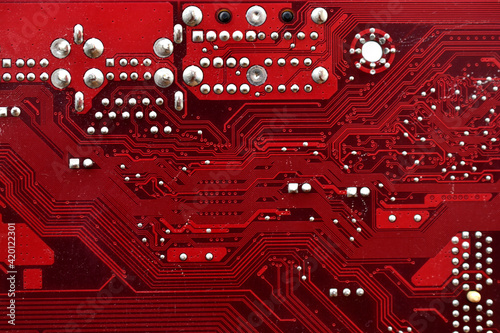 Red surface of the motherboard chip with connectors