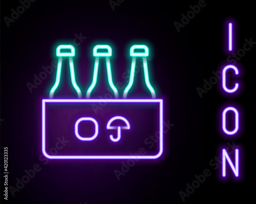 Glowing neon line Pack of beer bottles icon isolated on black background. Case crate beer box sign. Colorful outline concept. Vector