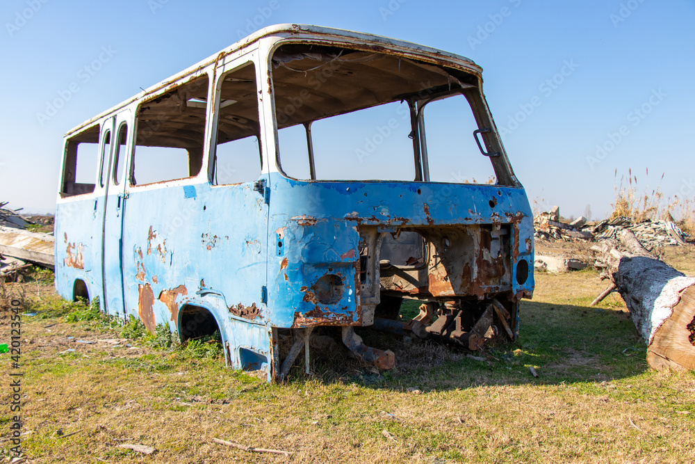 Abandoned old bus. Rusted old blue van. Made in USSR.