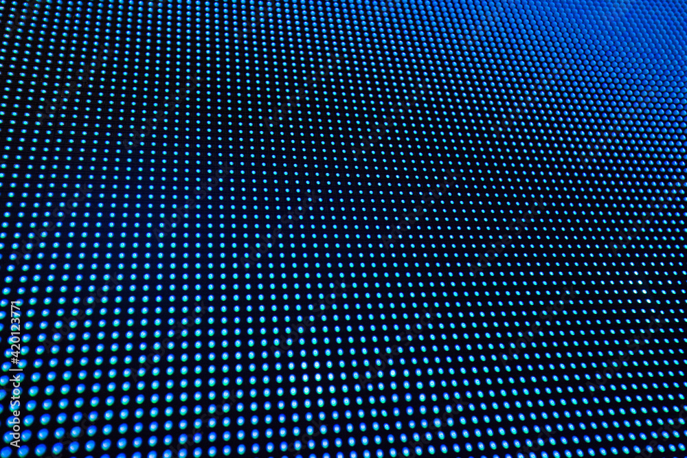 Closeup blue LED screen panel background. Video LED wall pixels. Closeup blue LED screen panel background. Video LED wall pixels.