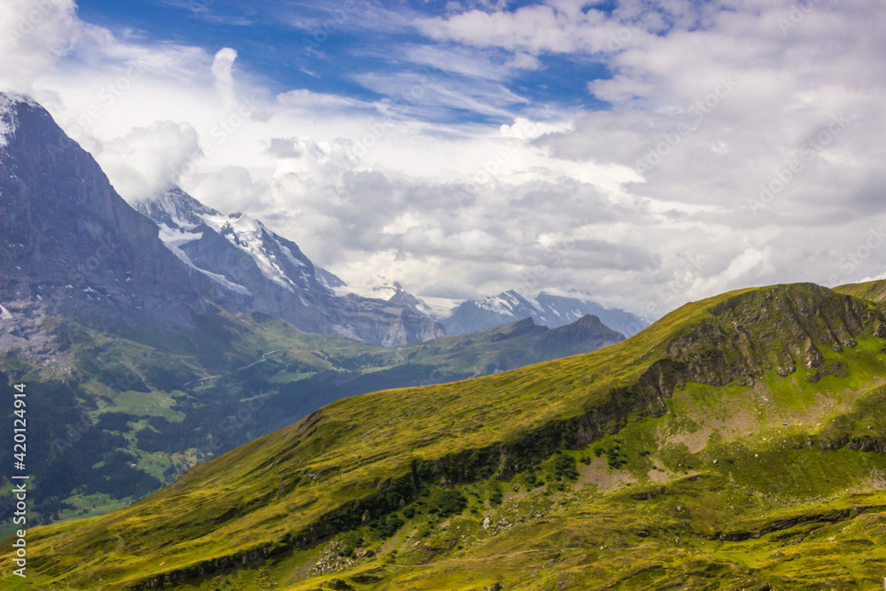 Fototapeta premium The Grindewald Valley and mountain trail in Switzerland on a sunny day