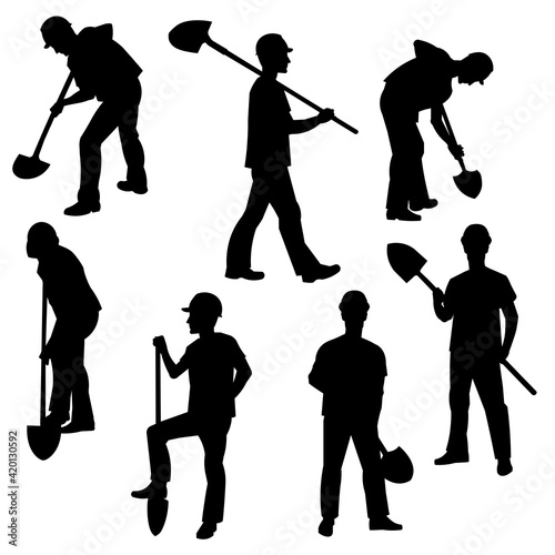 A set of vector silhouettes of a worker with a shovel standing, walking, digging